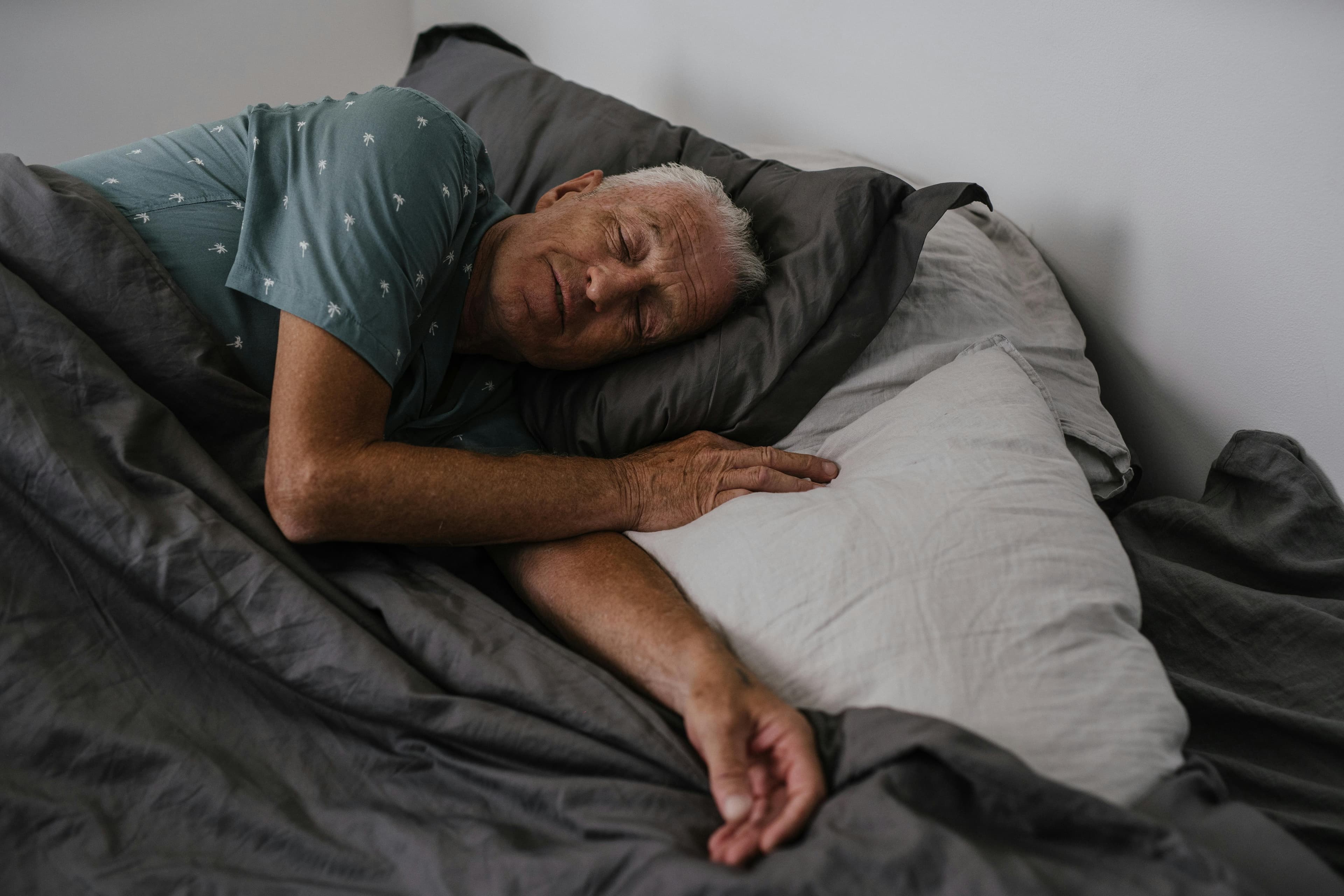 Person sleeping peacefully receiving respite care at home